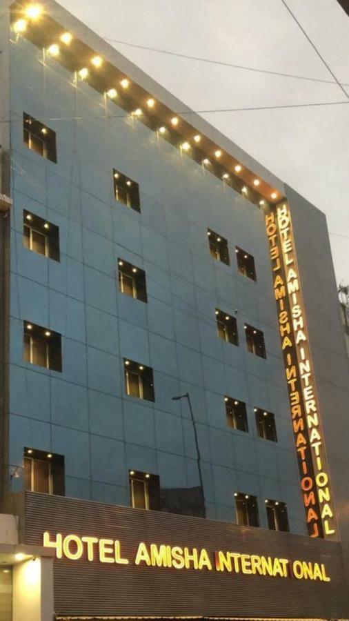 Hotel Amisha International Surat Exterior photo
